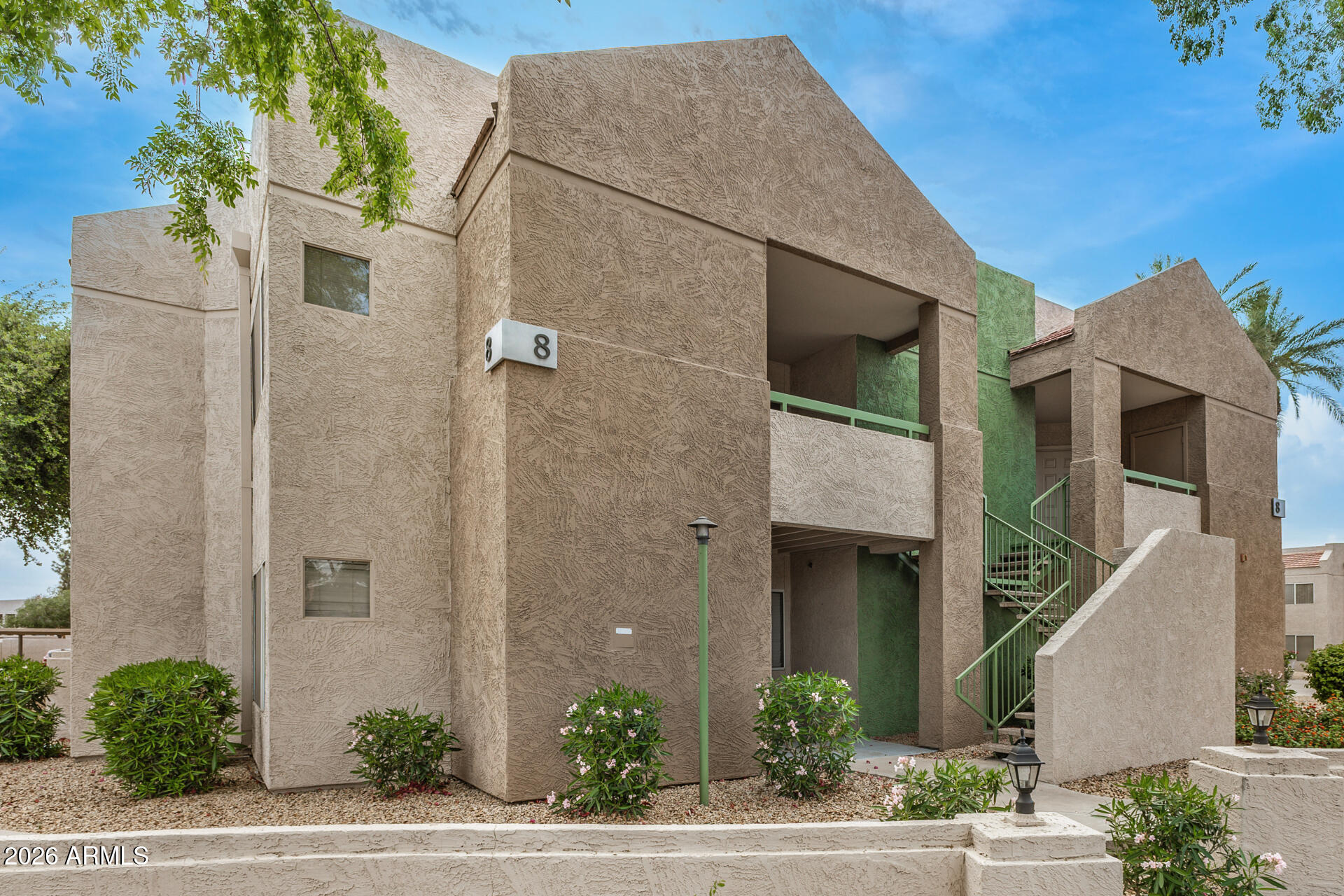 1295 North Ash Street, Unit 828 Gilbert, AZ 85233 - Photo 29 of 43 a front view of a house with a yard