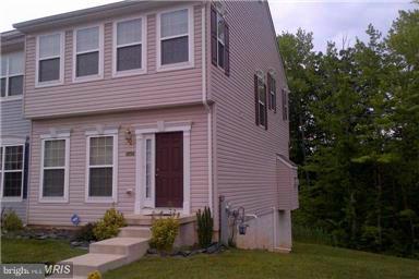 1954 Waltman Road Edgewood, MD 21040 - Photo 1 of 11 a front view of a house with garden