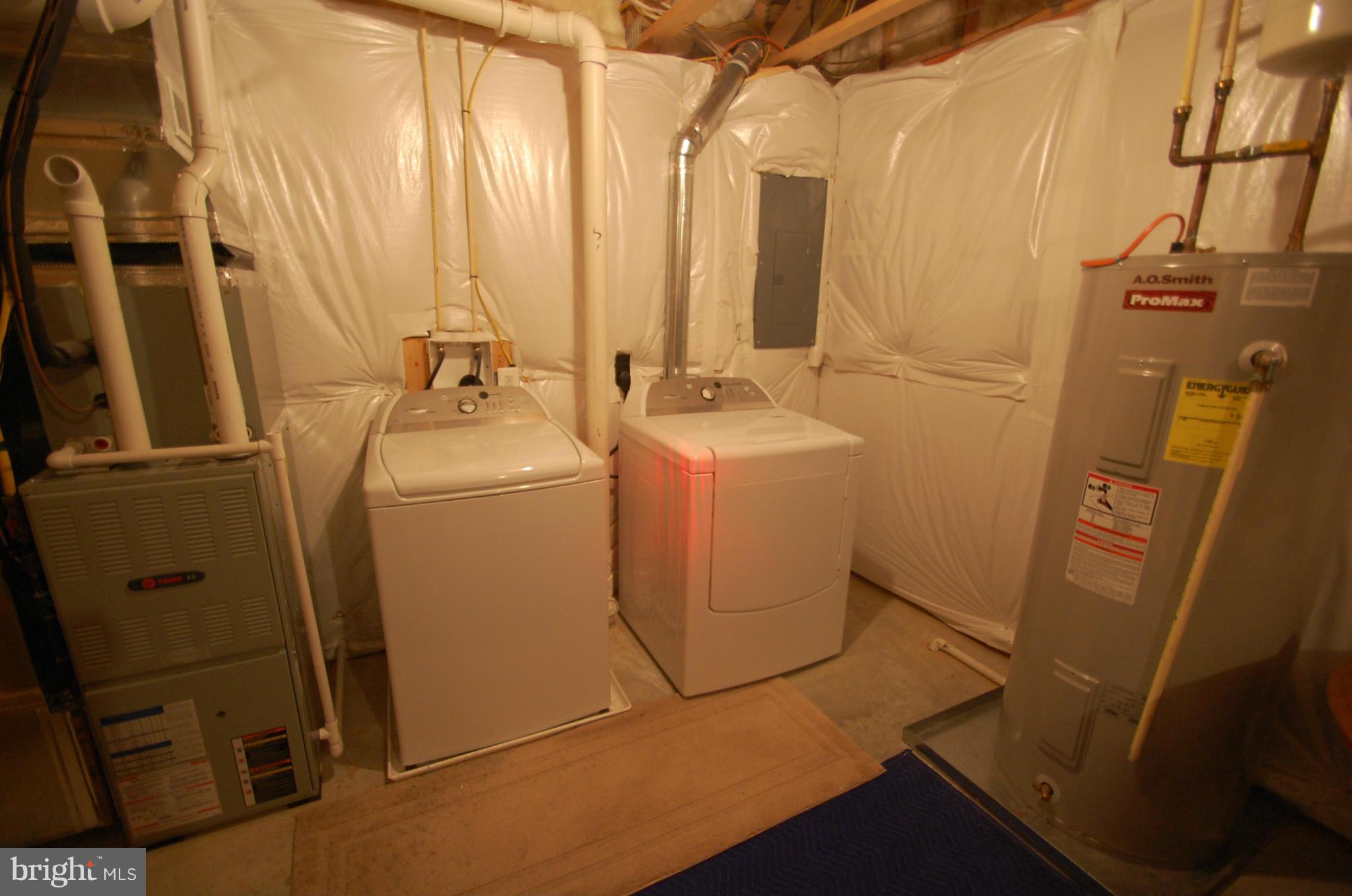 1954 Waltman Road Edgewood, MD 21040 - Photo 11 of 11 a view of storage and utility room with two washing machine