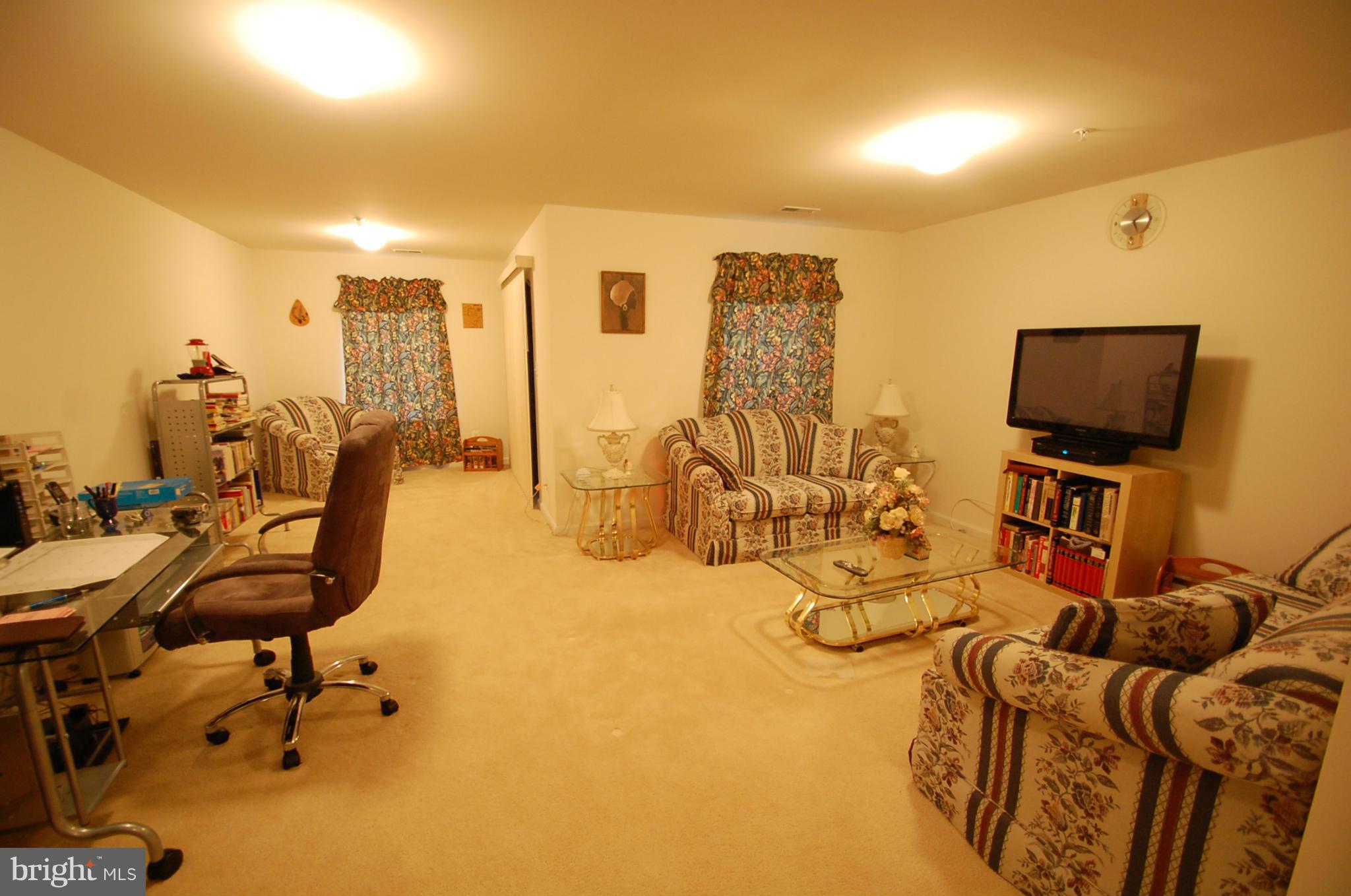 1954 Waltman Road Edgewood, MD 21040 - Photo 10 of 11 a view of a livingroom with furniture and a flat screen tv