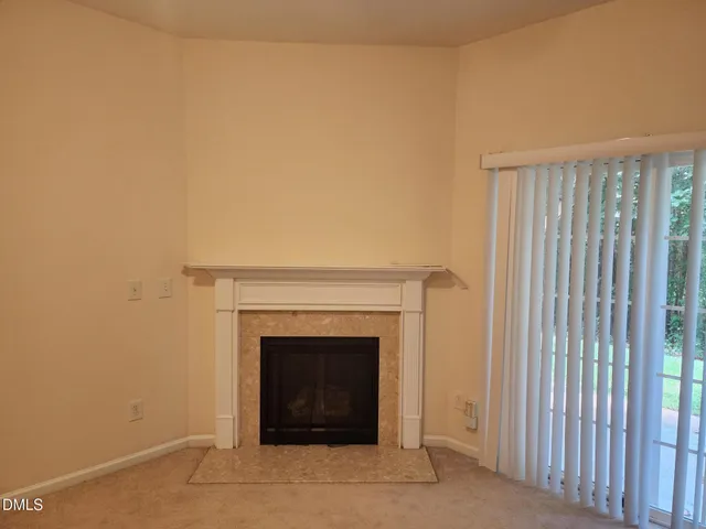 a living room with a fireplace