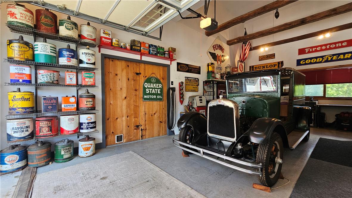585 Buttermilk Road Hellertown, PA 18055 - Photo 69 of 82 An impressive vintage car collection finds its home within this spacious, well-appointed garage.