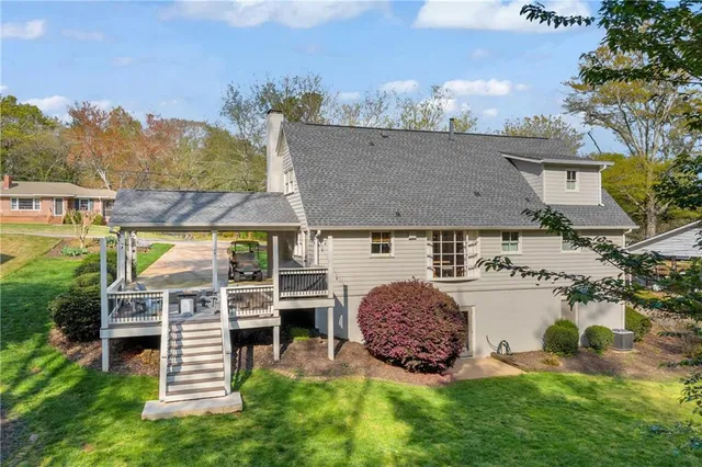 a kitchen with stainless steel appliances a stove cabinets and a center island