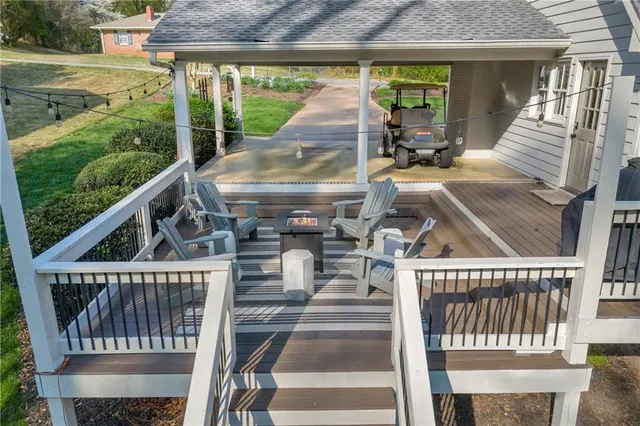 a kitchen with stainless steel appliances a refrigerator and a stove top oven