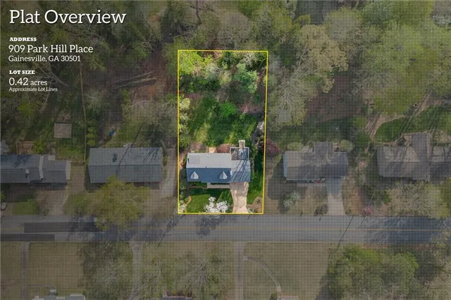 a front view of a house with a yard table and chairs