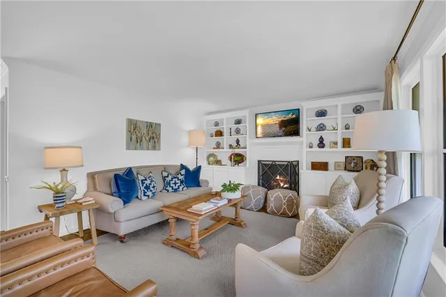 a bathroom with a double vanity sink mirror and shower