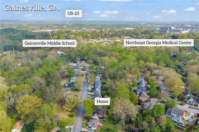 a front view of a house with a yard and porch