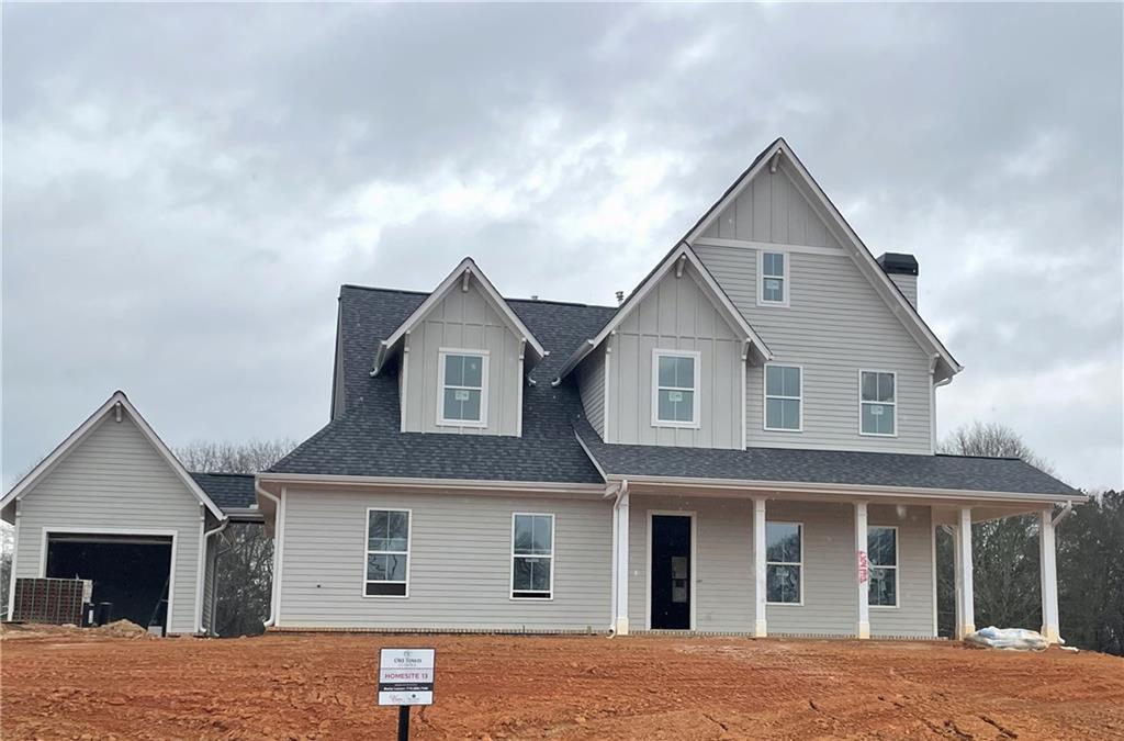 129 Ewing Way Dacula, GA 30019 - Photo 1 of 1 a front view of a house with a yard
