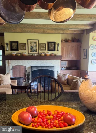 an aerial view of house with yard swimming pool and outdoor seating