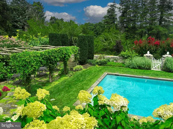 a living room with couches and a fireplace
