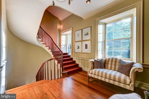 a view of a garden with a building in the background