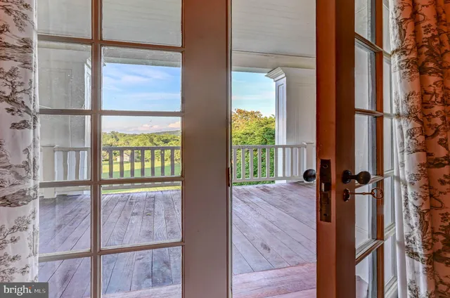 a kitchen with stainless steel appliances granite countertop a sink a stove top oven a counter space and cabinets