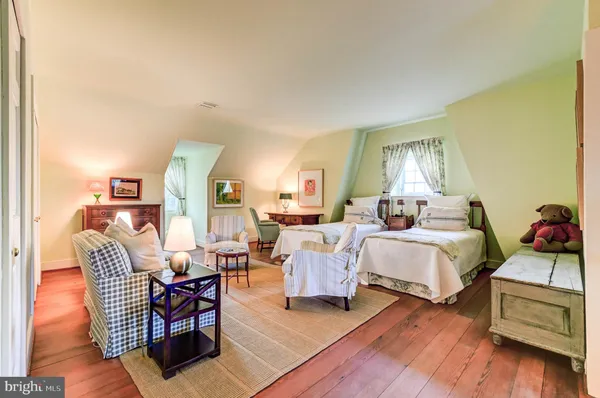 a view of a lake with a yard