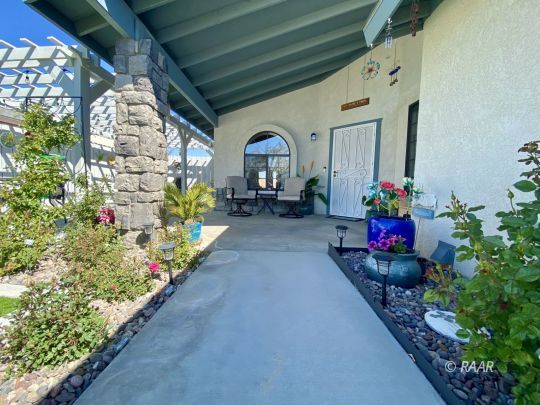 812 Charles Court Ridgecrest, CA 93555 - Photo 8 of 32 a view of a porch with furniture
