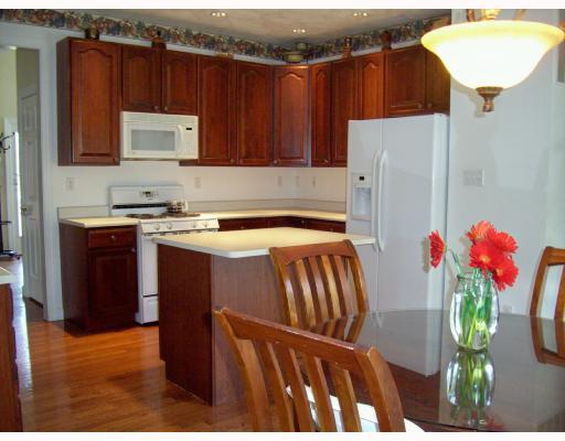 209 East Harbison Road Pittsburgh, PA 15205 - Photo 4 of 8 Kitchen. The kitchen features a center island and cherry cabinetry.