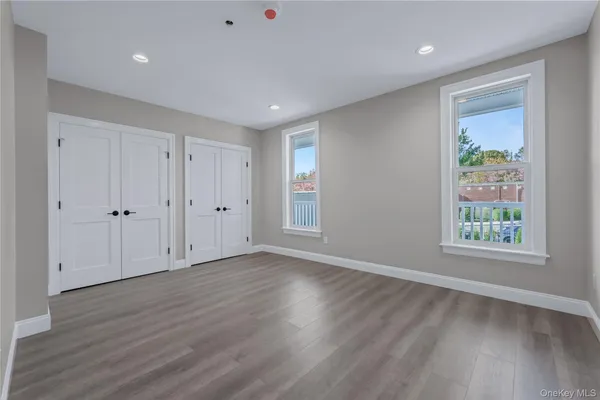a view of kitchen with wooden floor