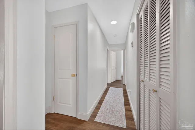 a bedroom with a bed and a table