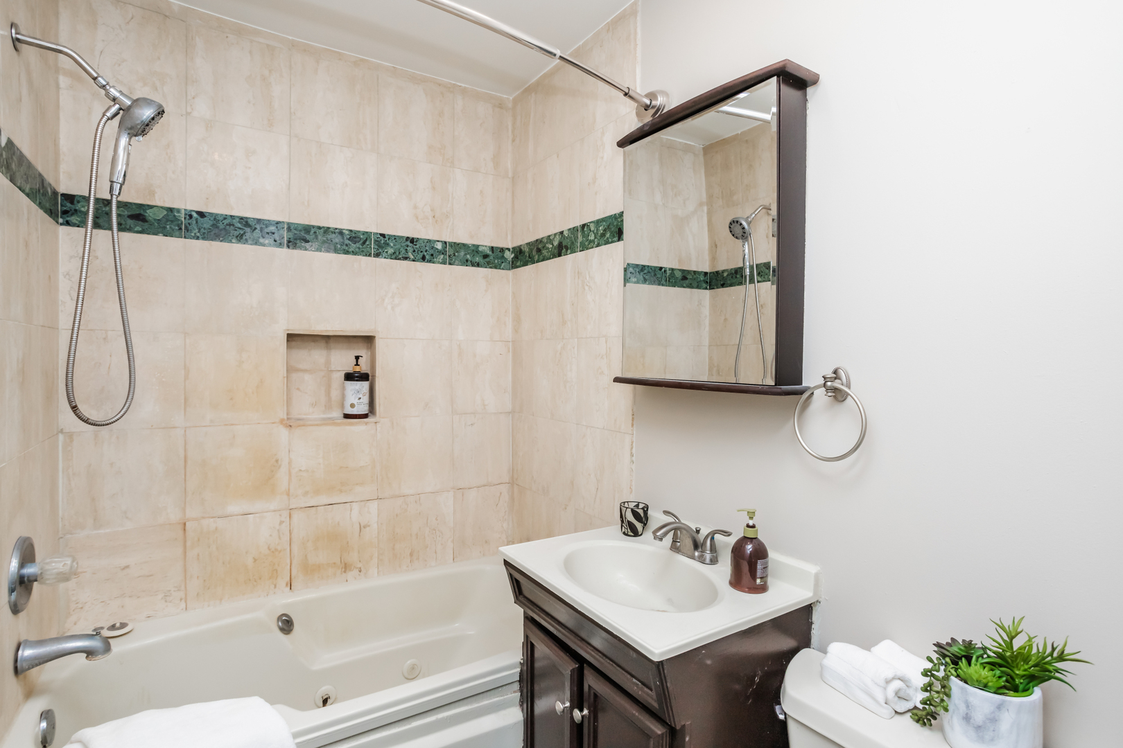 15W271 91st Street Burr Ridge, IL 60527 - Photo 13 of 30 a bathroom with a sink vanity mirror and shower