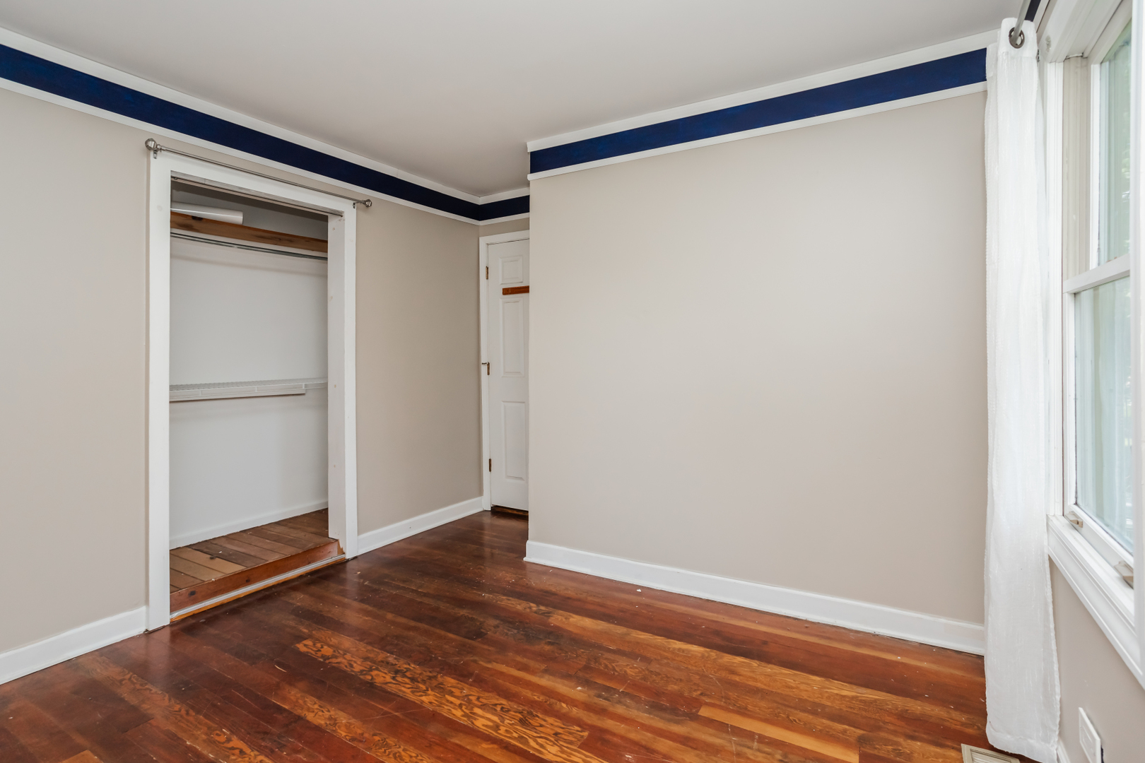 15W271 91st Street Burr Ridge, IL 60527 - Photo 15 of 30 a view of empty room with wooden floor