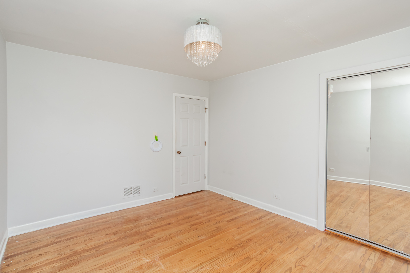 15W271 91st Street Burr Ridge, IL 60527 - Photo 17 of 30 a view of empty room with wooden floor