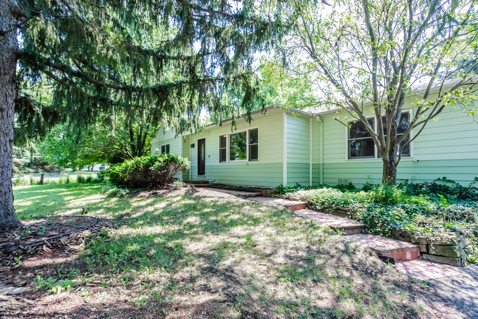 15W271 91st Street Burr Ridge, IL 60527 - Photo 2 of 30 a view of a house with a yard