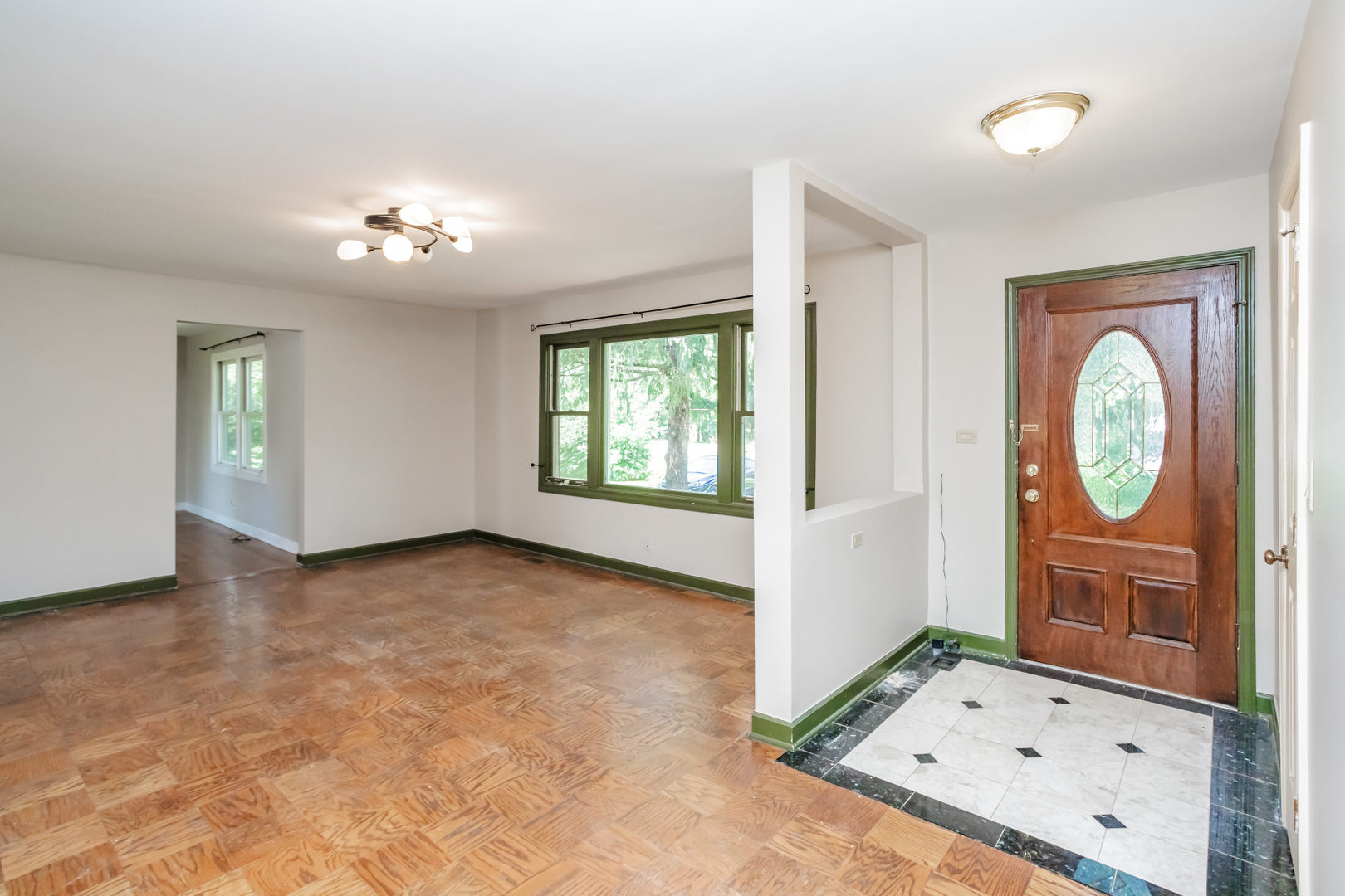 15W271 91st Street Burr Ridge, IL 60527 - Photo 3 of 30 an empty room with windows