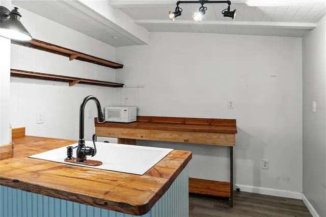 a room with a sink and a window