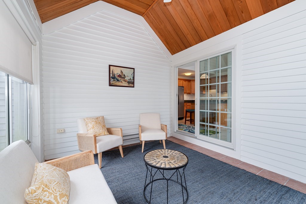 23 Gold Leaf Lane, Unit 23 Mashpee, MA 02649 - Photo 11 of 32 a living room with furniture and a window