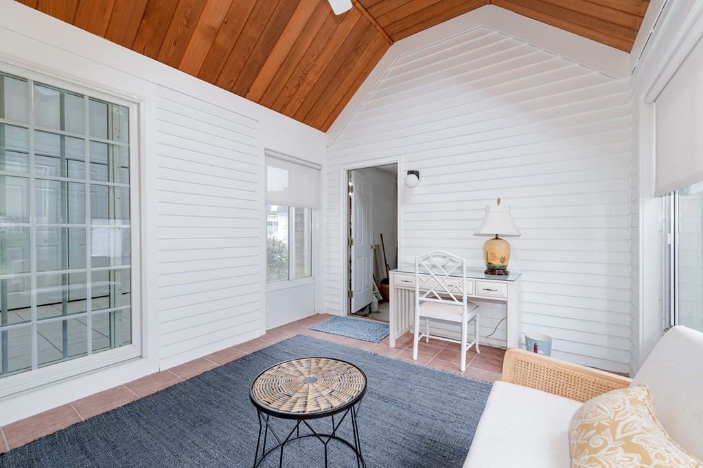 23 Gold Leaf Lane, Unit 23 Mashpee, MA 02649 - Photo 13 of 32 a living room with furniture and wooden floor