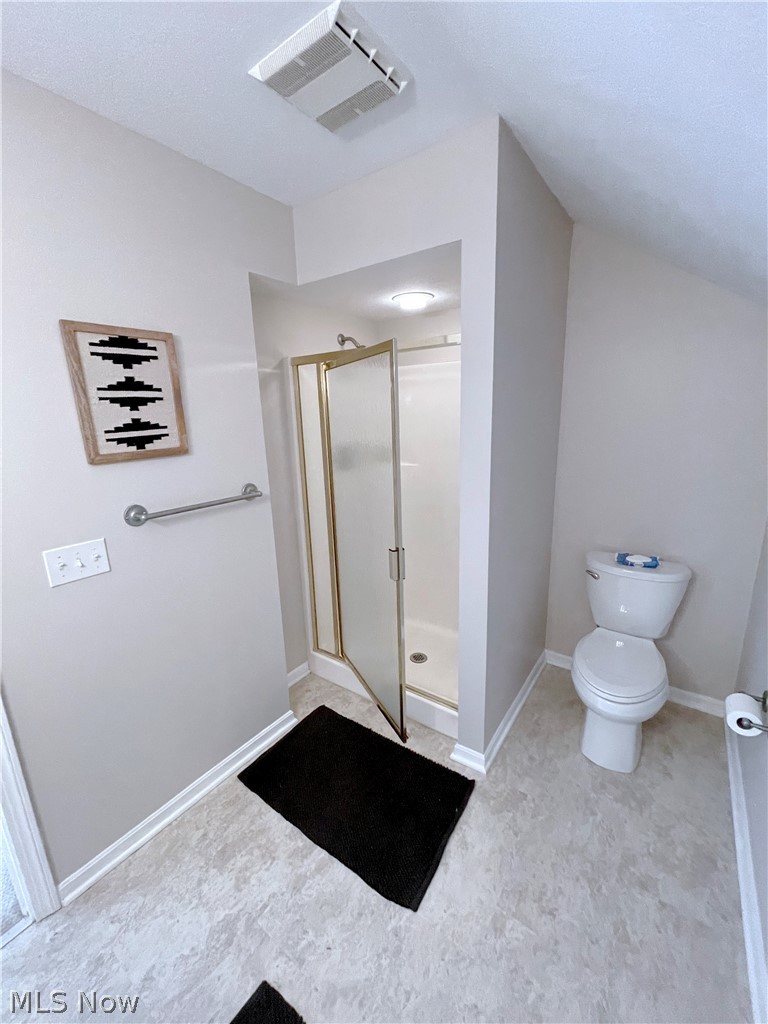 718 Sunridge Road Fairlawn, OH 44333 - Photo 32 of 49 Bathroom with toilet, tile flooring, and a shower with shower door