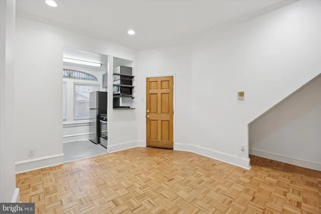 a view of a livingroom with a furniture