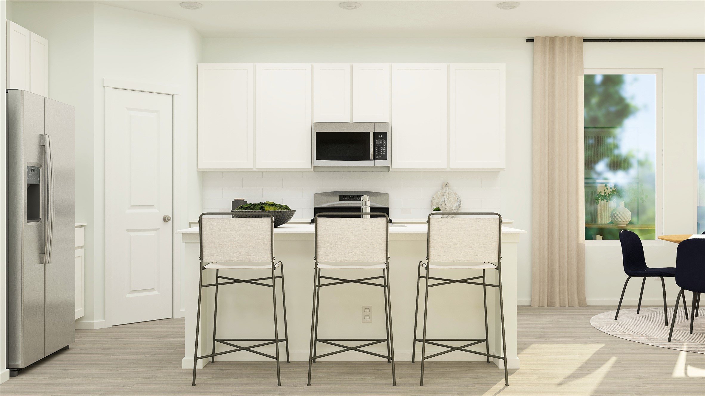 17911 Prairie Falcon Way, Unit 5 Pflugerville, TX 78660 - Photo 15 of 24 a white kitchen with a table and chairs in it