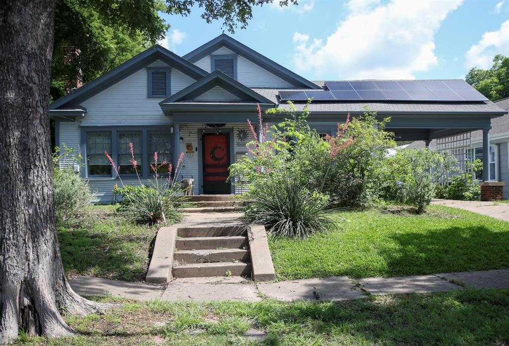 1500 Bonham Street Commerce, TX 75428 - Photo 2 of 29 a front view of a house with a yard