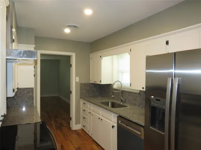 a empty room with wooden floor