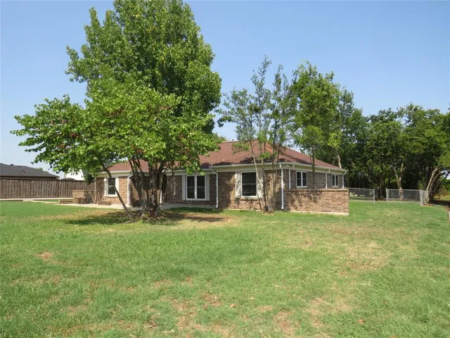 wooden floor fireplace and natural light in a room