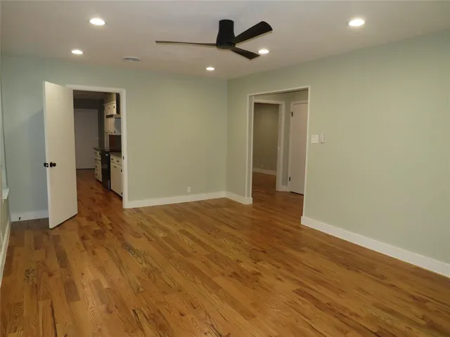 a kitchen with a sink stove and refrigerator