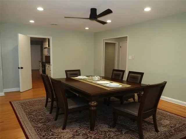 a kitchen with granite countertop a stove and a refrigerator