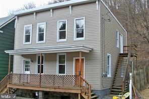 446-448 Goethe Street Cumberland, MD 21502 - Photo 1 of 2 a view of a house with a deck