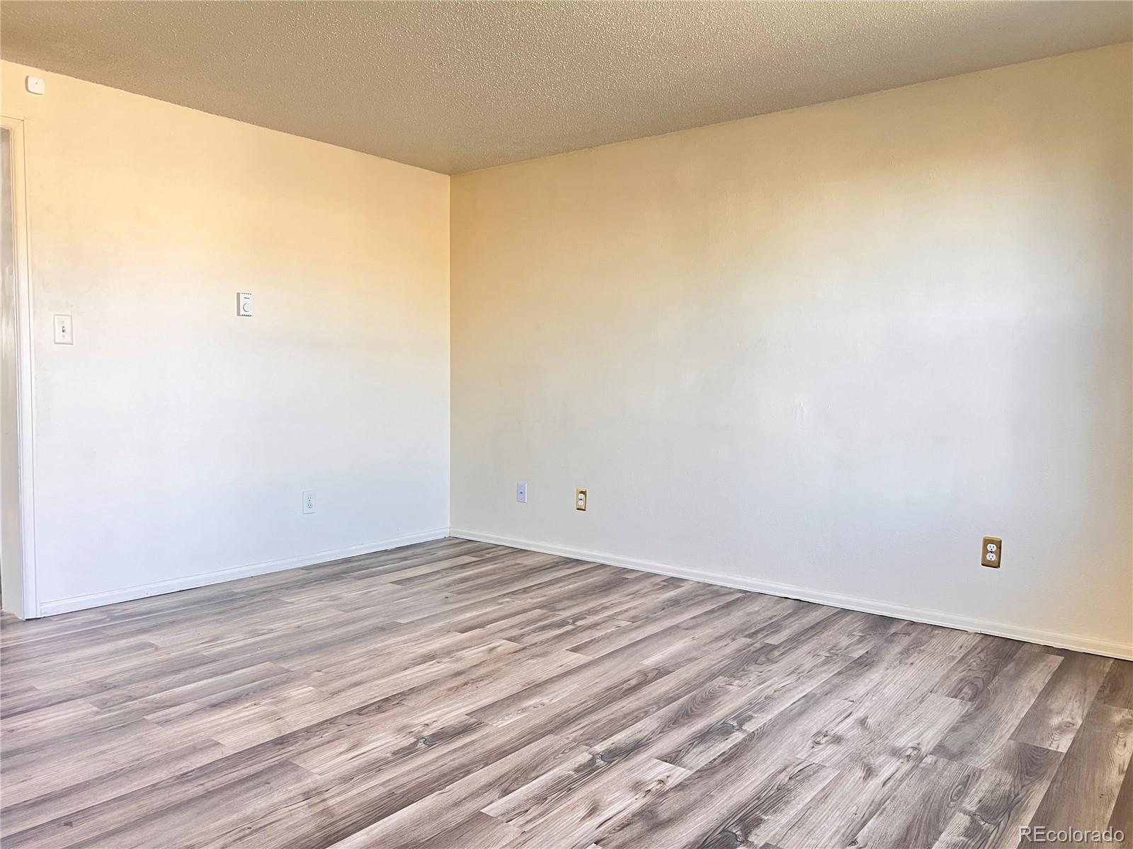 1711 Norfolk Street, Unit D Aurora, CO 80011 - Photo 5 of 16 a view of room