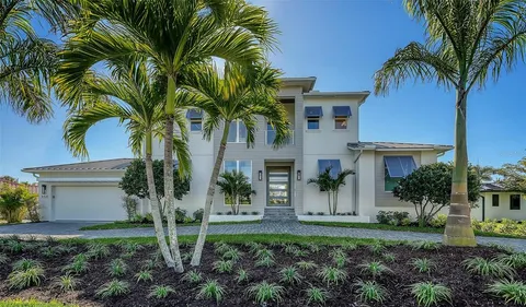 a view of a yard in front of a house