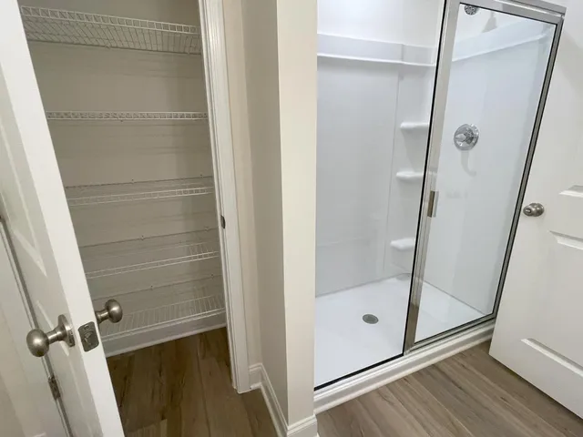 a bathroom with a sink a mirror and a toilet