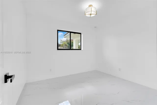 $899,900 | 695 West 73rd Place, Hialeah, FL 33014