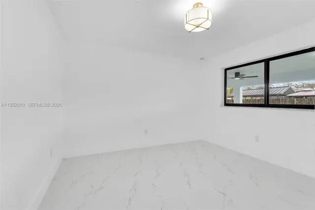 $899,900 | 695 West 73rd Place, Hialeah, FL 33014