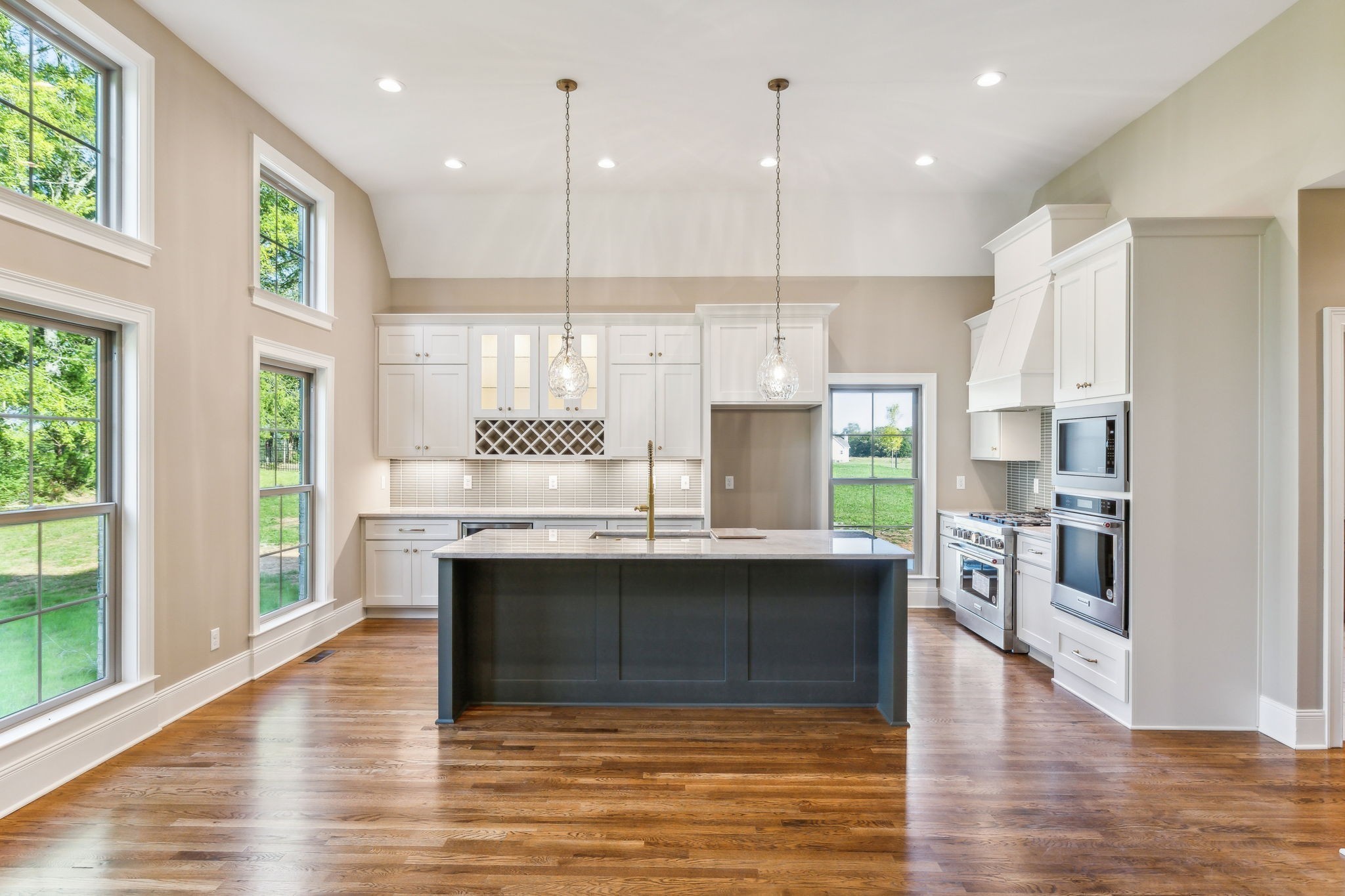 1611 Martha Washington Way Murfreesboro, TN 37130 - Photo 19 of 72 a large kitchen with stainless steel appliances a large center island and a window