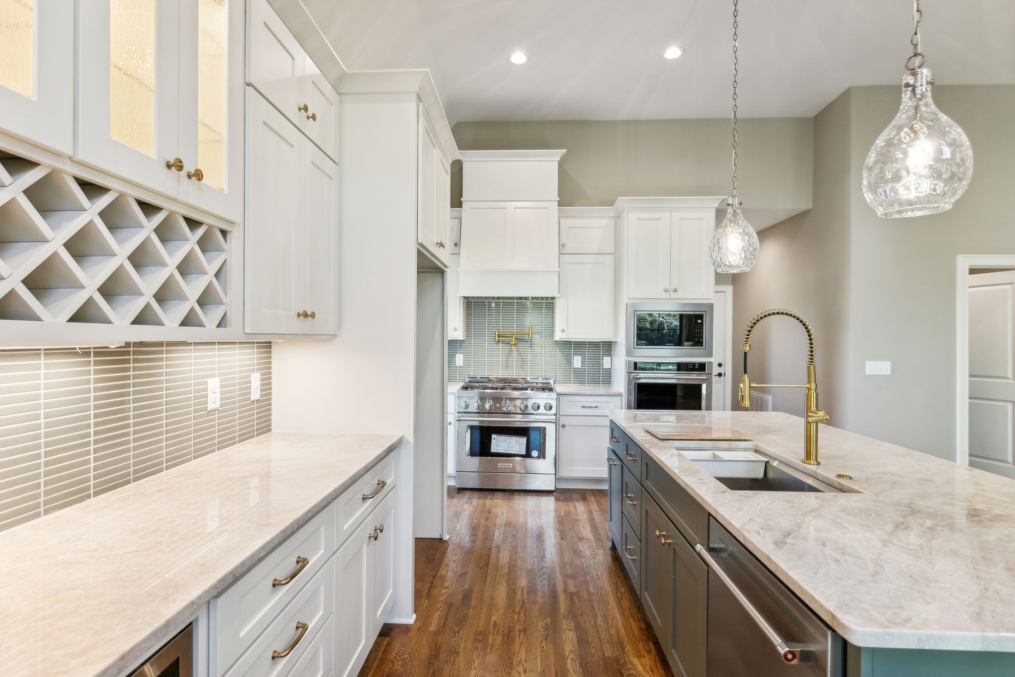 1611 Martha Washington Way Murfreesboro, TN 37130 - Photo 25 of 72 a large kitchen with stainless steel appliances granite countertop a stove and a sink with cabinets
