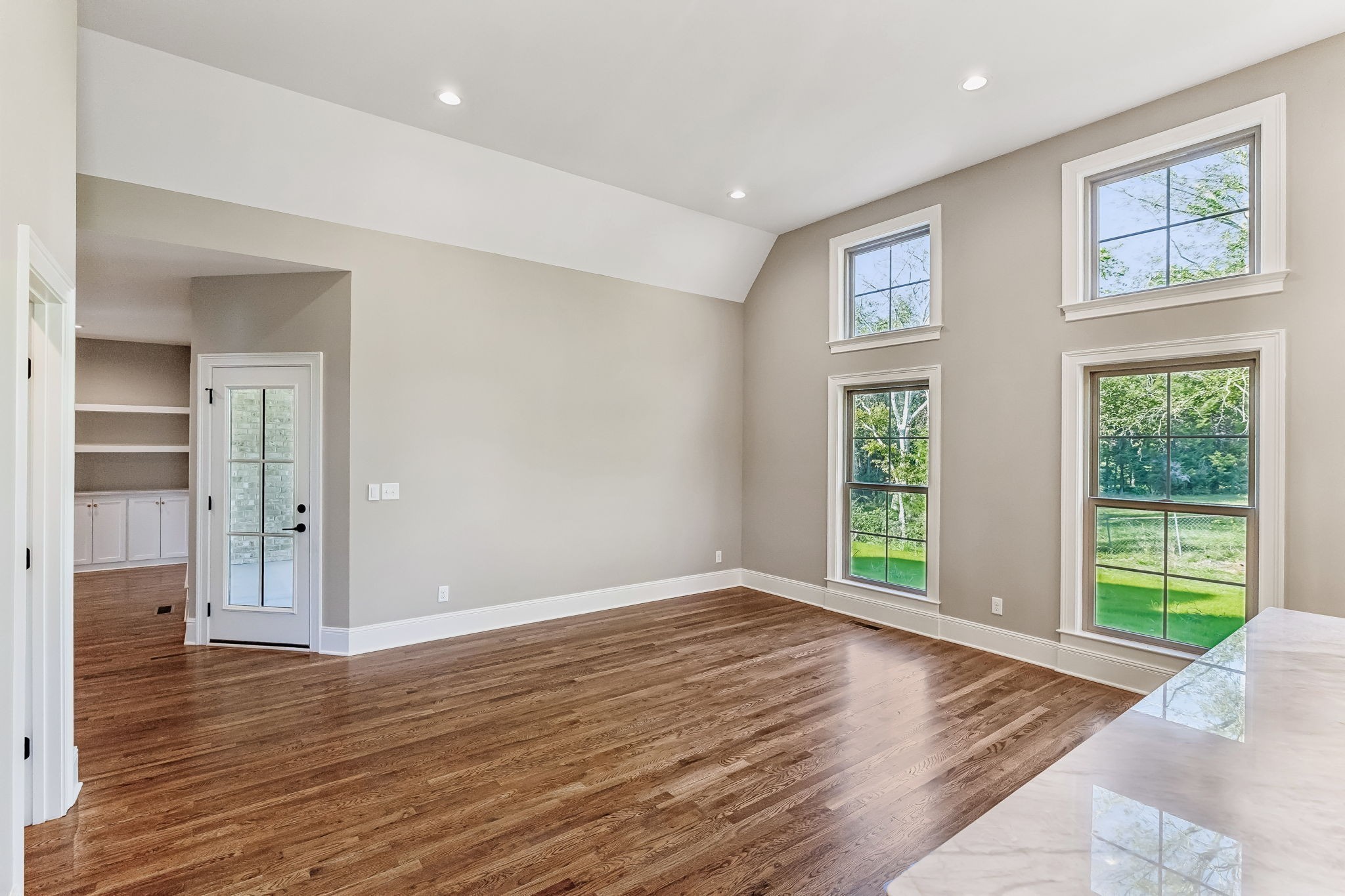 1611 Martha Washington Way Murfreesboro, TN 37130 - Photo 29 of 72 a view of an empty room with wooden floor and windows