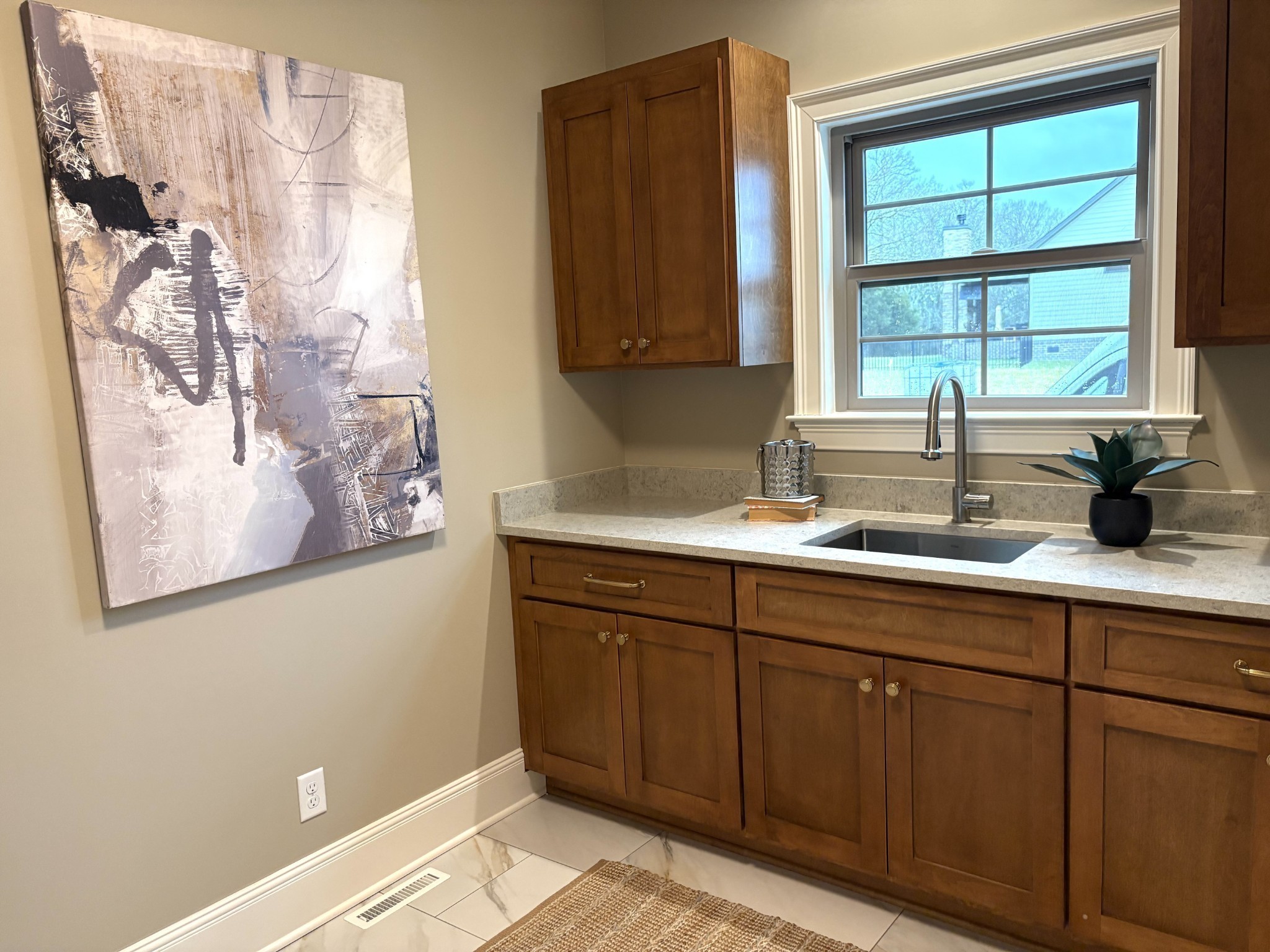 1611 Martha Washington Way Murfreesboro, TN 37130 - Photo 31 of 72 a kitchen with a sink and cabinets