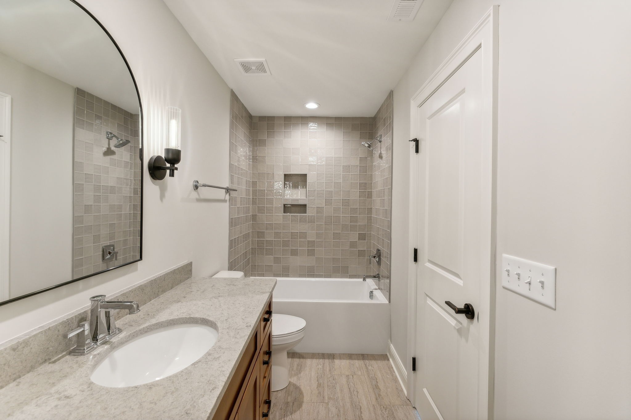 1611 Martha Washington Way Murfreesboro, TN 37130 - Photo 59 of 72 a bathroom with a sink a granite tub and a mirror