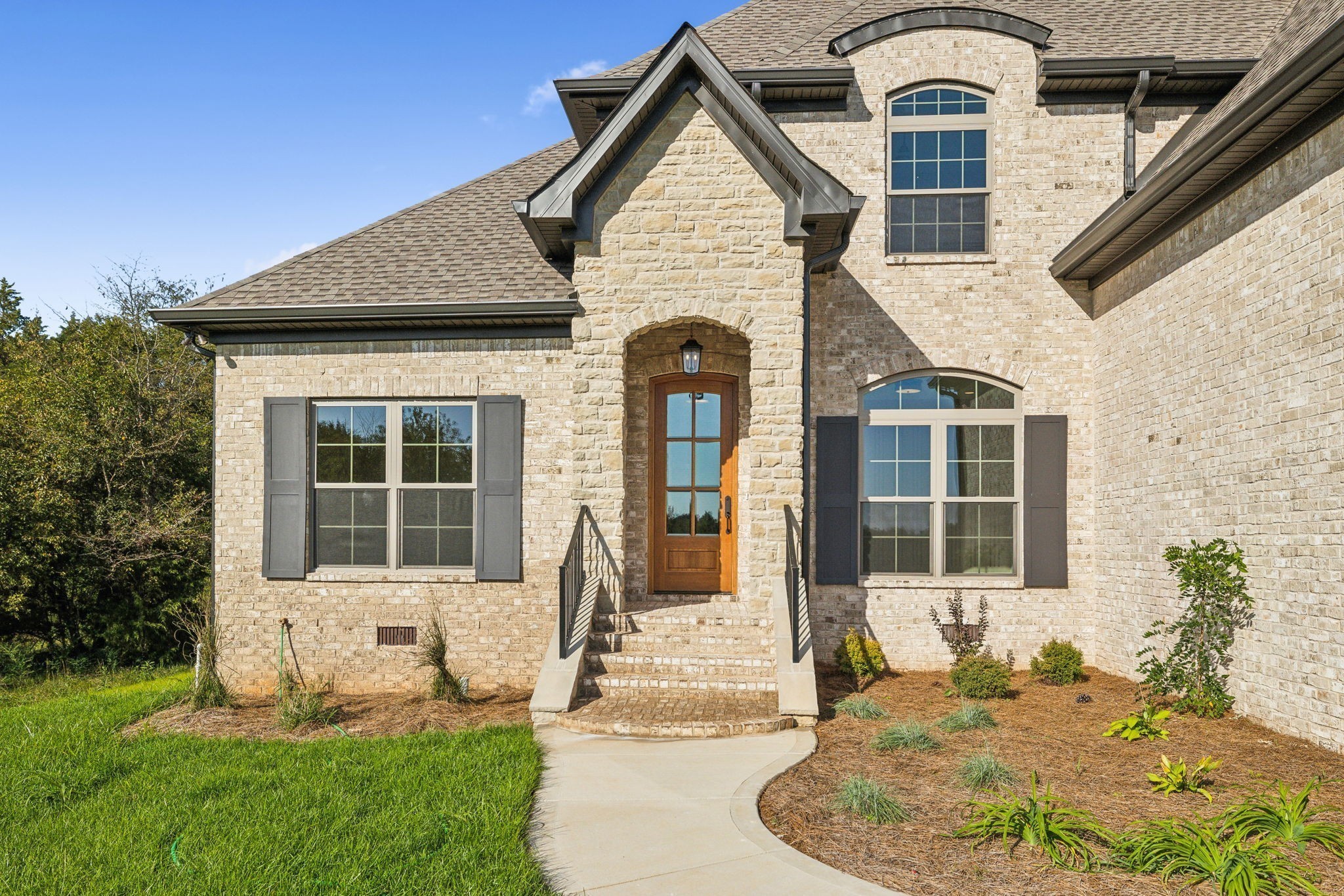 1611 Martha Washington Way Murfreesboro, TN 37130 - Photo 6 of 72 a front view of a house with garden