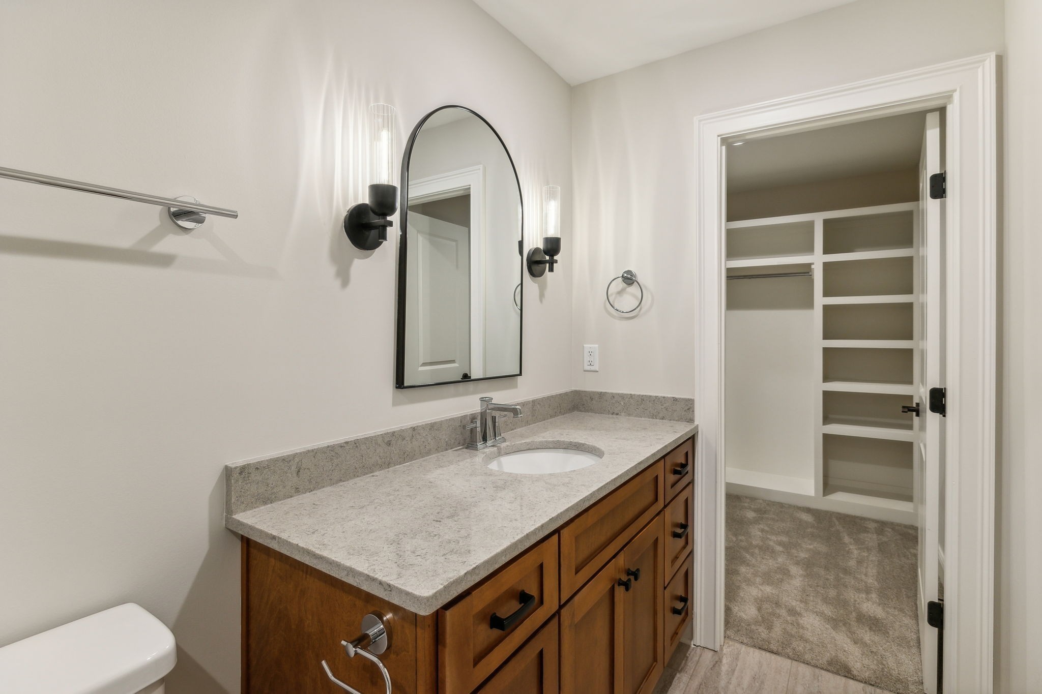 1611 Martha Washington Way Murfreesboro, TN 37130 - Photo 63 of 72 a bathroom with a granite countertop sink a toilet and a mirror